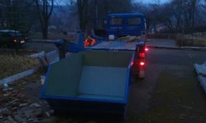 Вывоз строительного мусора бункером 8 куб.м
