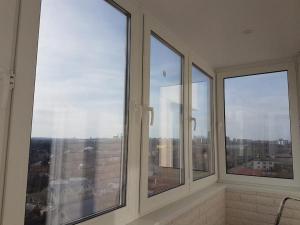 Окна Rehau- остекление балконов