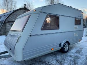 Крепкий малыш-крепыш,караван-турист,дом на колёсах,караван,кемпер,Прицеп дaча KIP Grey-Line Special 2000 года с палаткой 750 кг